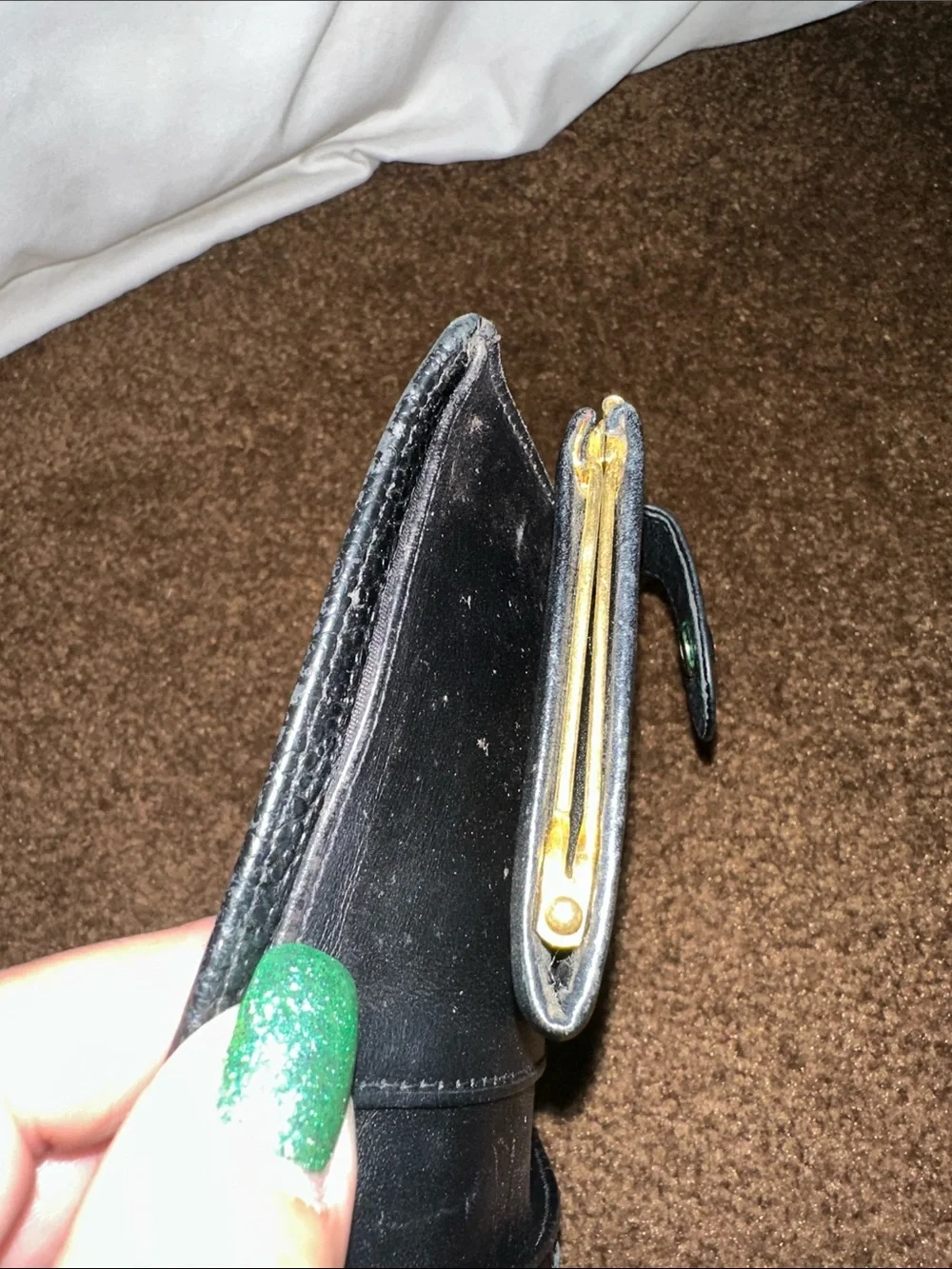 CHANEL Black Quilted CC Caviar Leather wallet.